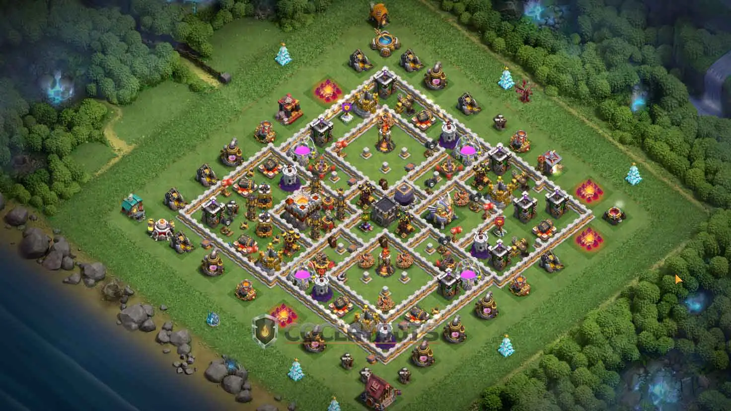 Town Hall 11 hybrid base layout with spaced storages and high-damage zones to discourage loot raids.
