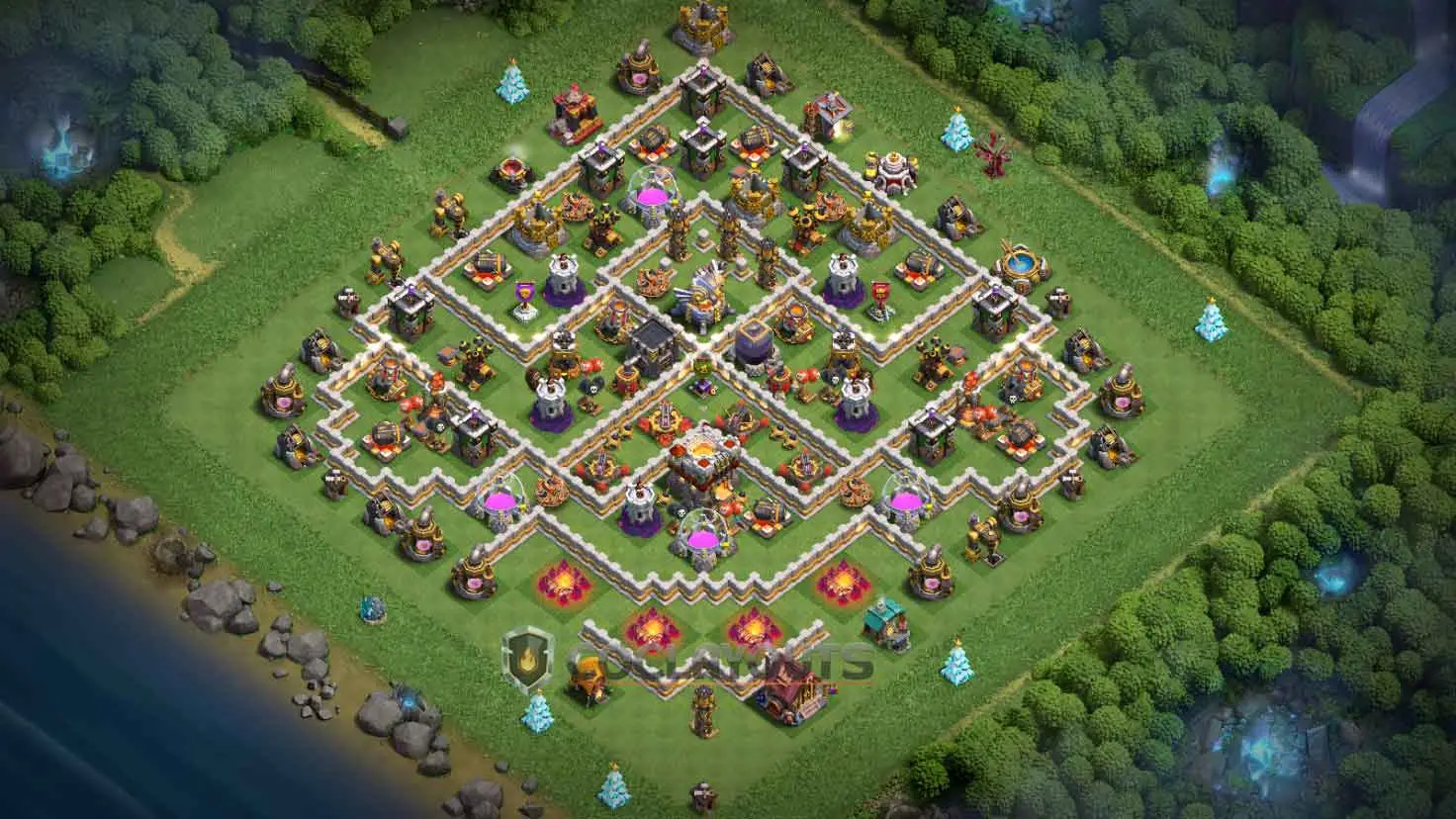 Clash of Clans TH11 base layout with top and bottom storage separation to prevent total loot loss.